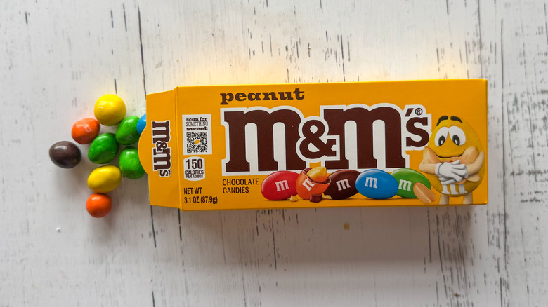 Peanut M&M's on white surface