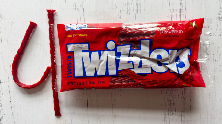 Twizzlers candy on white surface