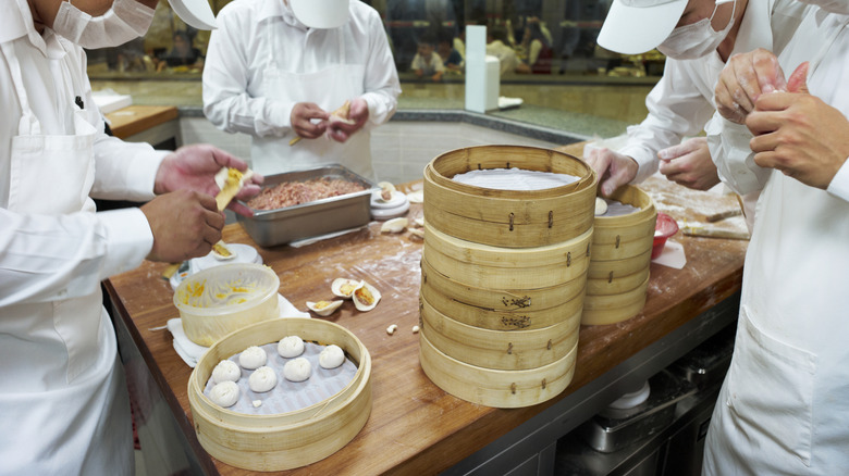 Chefs making dumplings at Din Tai Fung.