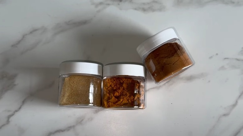 Spices inside three small jars