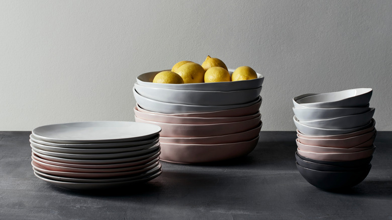Stoneware bowls and plates with lemons