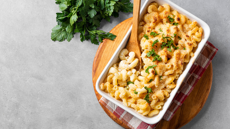 homemade mac and cheese topped with breadcrumbs and herbs