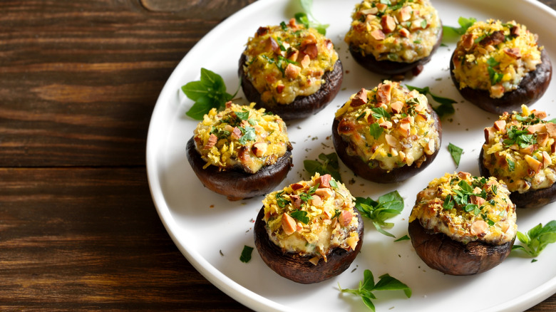 Stuffed mushrooms on white plate