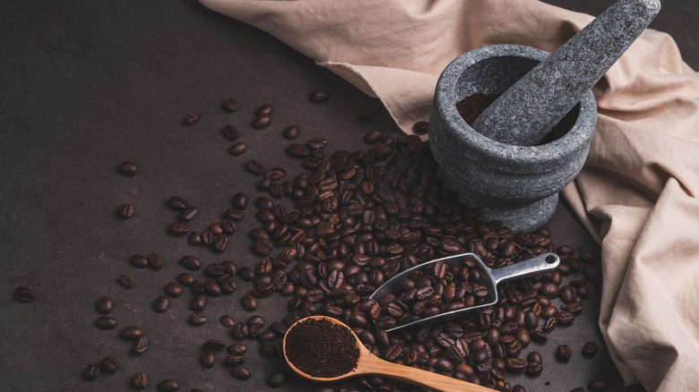 mortar and pestle grinding coffee