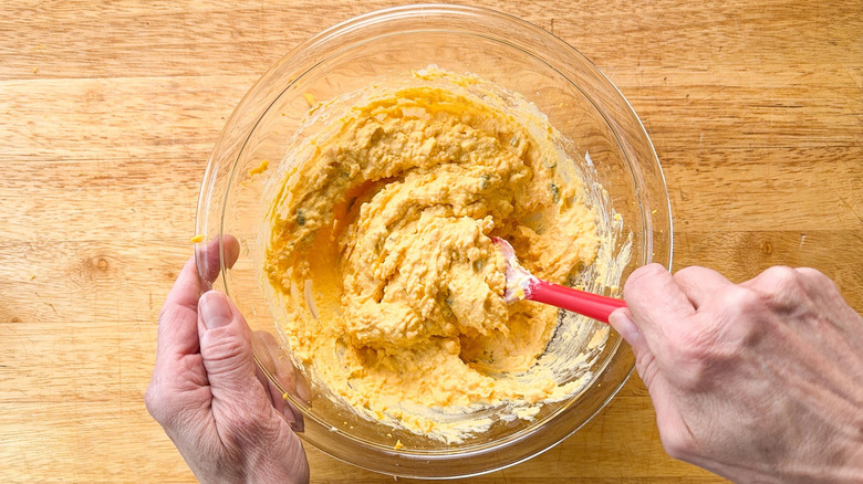 Mixing deviled egg filling