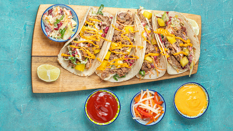 Tacos with dipping sauces