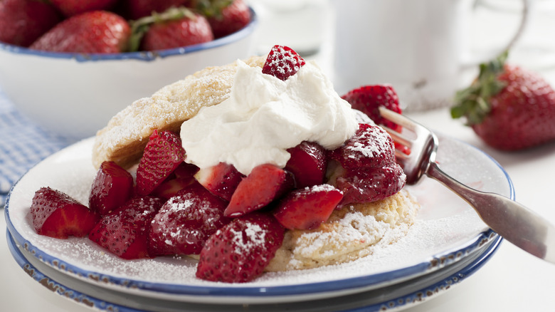 Assembled strawberry shortcake with fork
