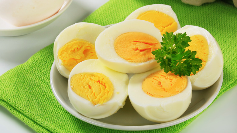 Pile of hard-boiled eggs on a plate