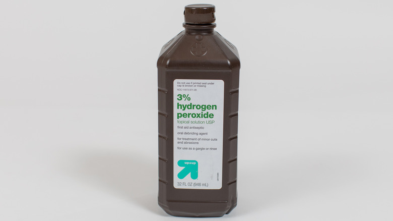 brown bottle filled with hydrogen peroxide
