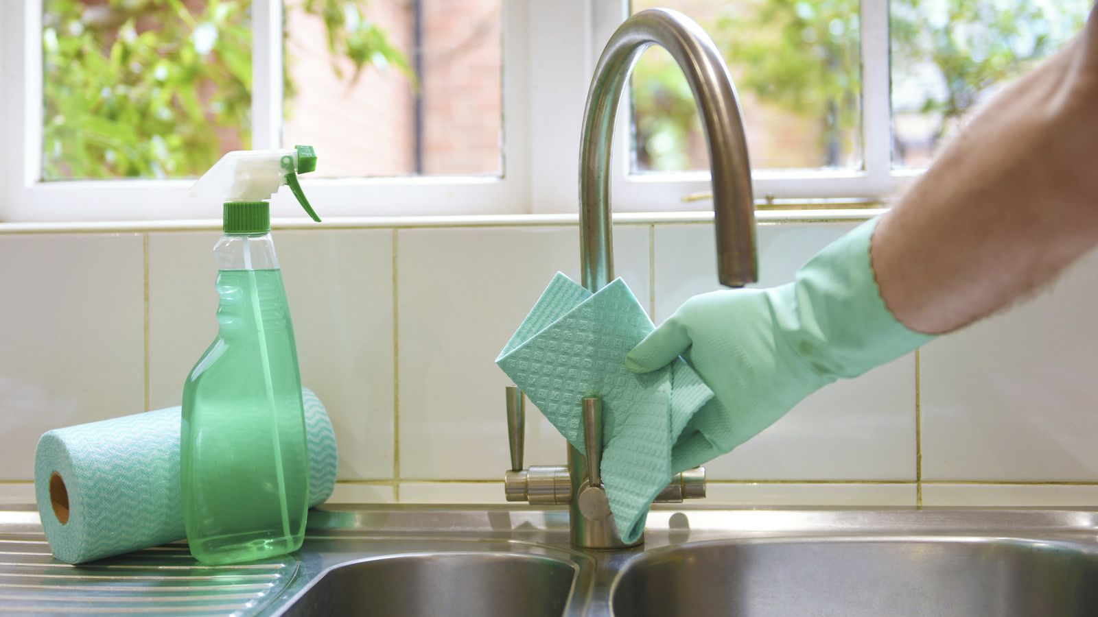 Kitchen sink disinfecting spray application