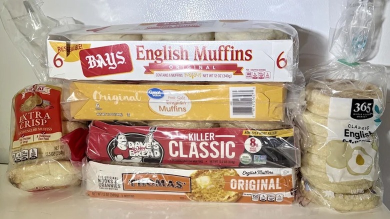 An assortment of English muffins stacked in a pile