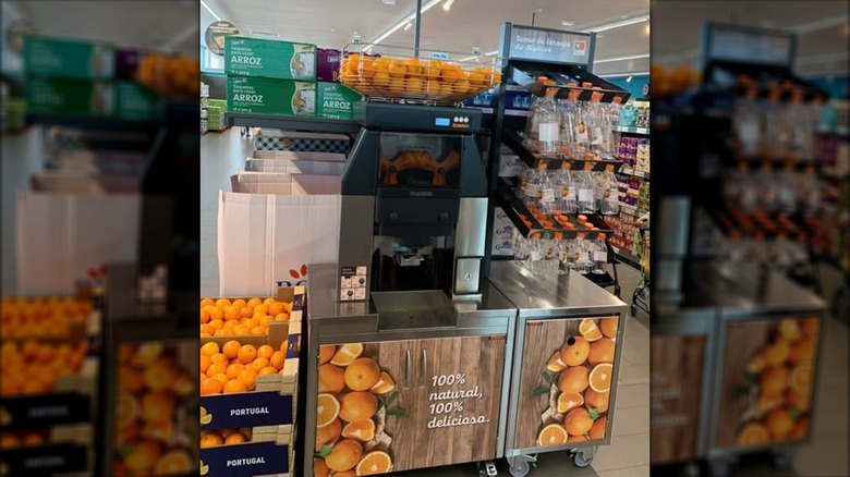Fresh squeezed orange juice station at European Aldi