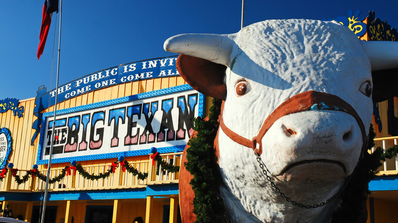 A large fake cow outside of The Big Texan steakhouse in Amarillo, Texas