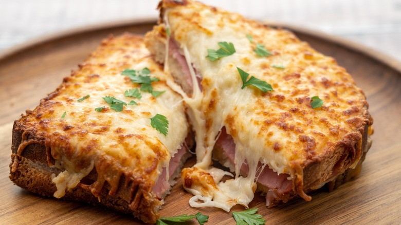 A croque monsieur sandwich cut in half