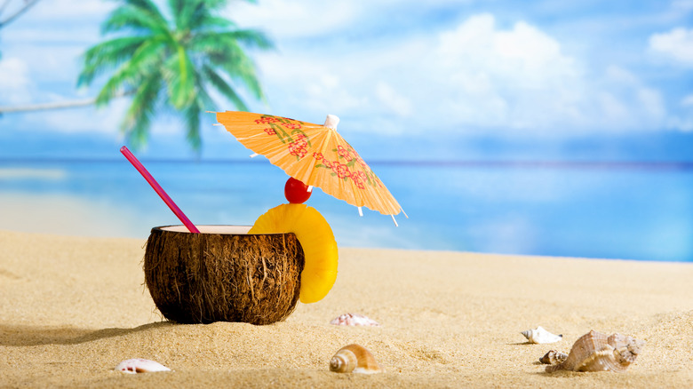 tropical coconut drink by the beach