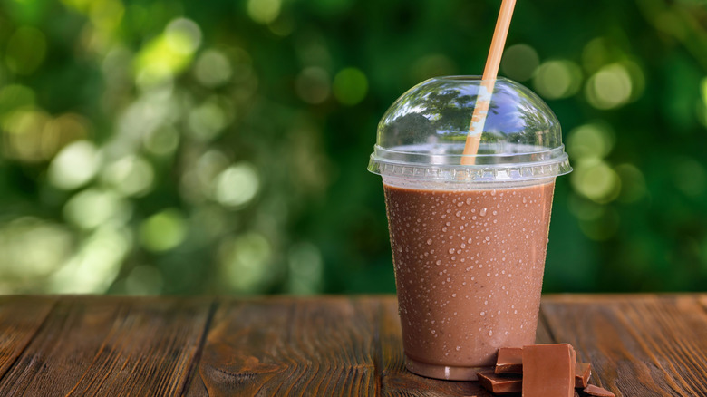 fast food chocolate milkshake on a table