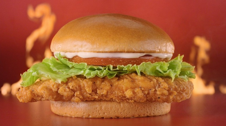 Wendy's spicy chicken sandwich with tomato, lettuce, and mayo