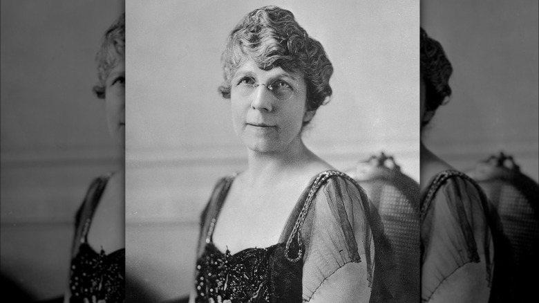 Florence Harding wearing glasses and an evening dress