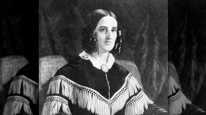 Sarah Polk seated and posing