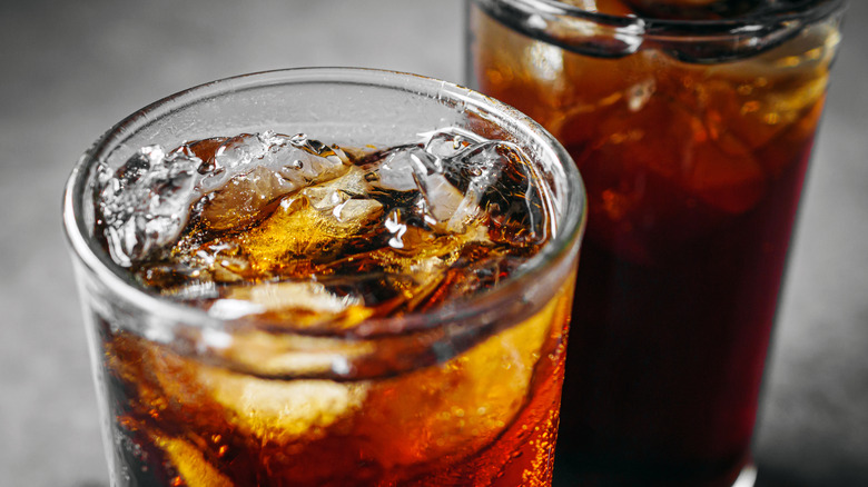 Cola and ice in two glasses