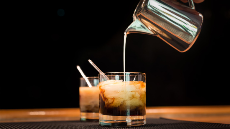 Pouring cream into white Russian