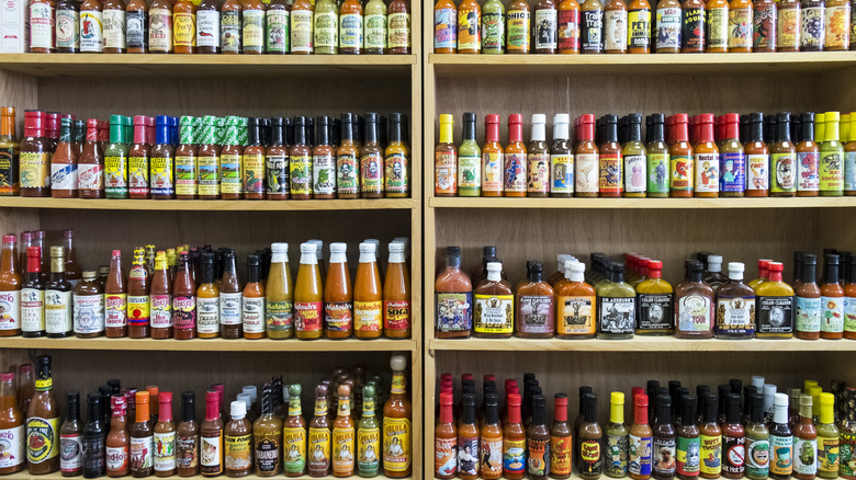 shelves full of hot sauces