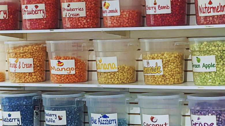Multi-flavored popcorn options offered on the shelf at Bulk Candy Store.