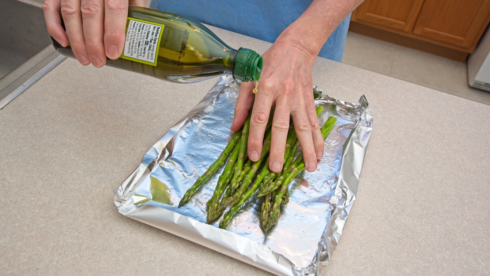 The Foil Packet Method For Grilling Perfect Asparagus On A Gas Grill