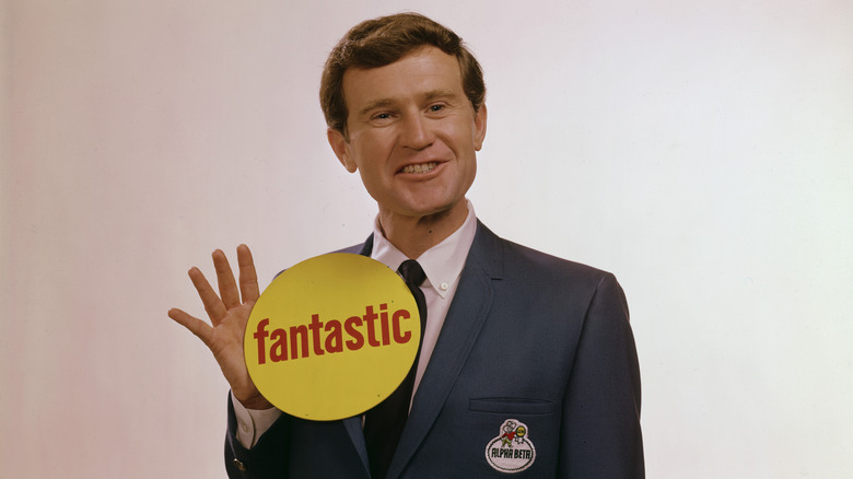 Alpha Beta spokesman wearing large yellow "Fantastic" button