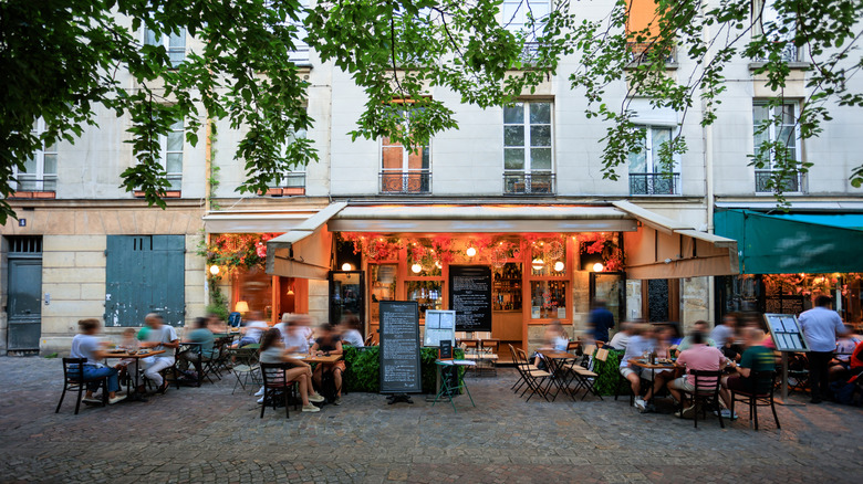 Outdoor seating at French restaurant.