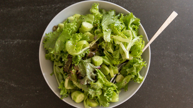 salad in a bowl with a fork