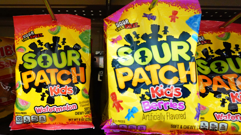 Sour Patch Kids in the candy aisle of a grocery store
