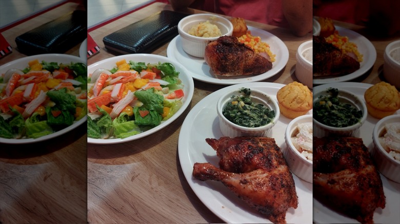 Rotisserie chicken and salad with cornbread and sides at a Kenny Rogers Roasters location in the Philippines