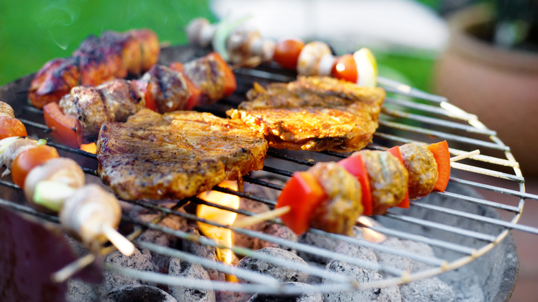 food cooking on charcoal grill 