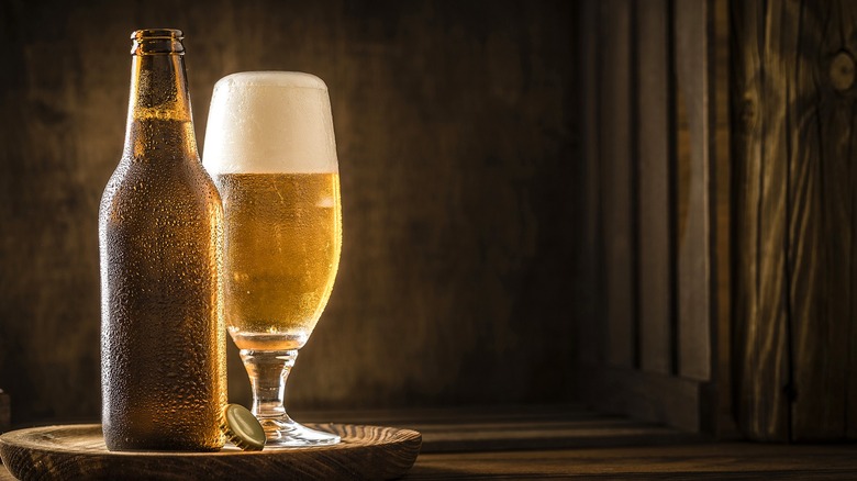 ice-cold beer in a bottle and glass