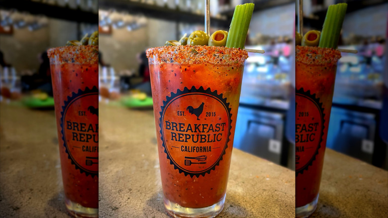 Breakfast Republic Bloody Mary in pint glass on a gray counter