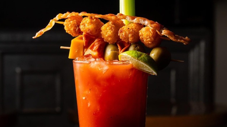 Tick Tock Lounge Bloody Mary with tater tot skewer and veggies