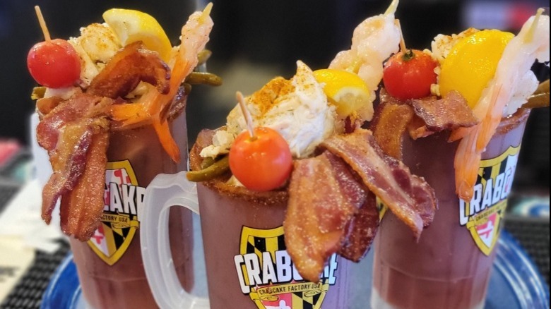 Three Bloody Marys in Crabcake Factory souvenir cups