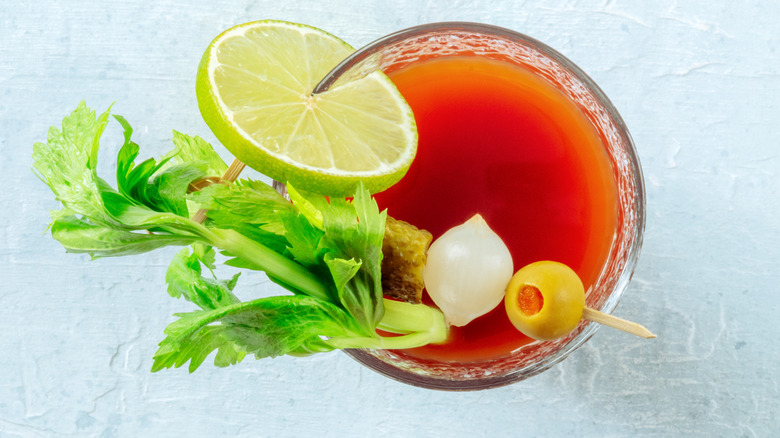 Aerial view of classic Bloody Mary on white counter
