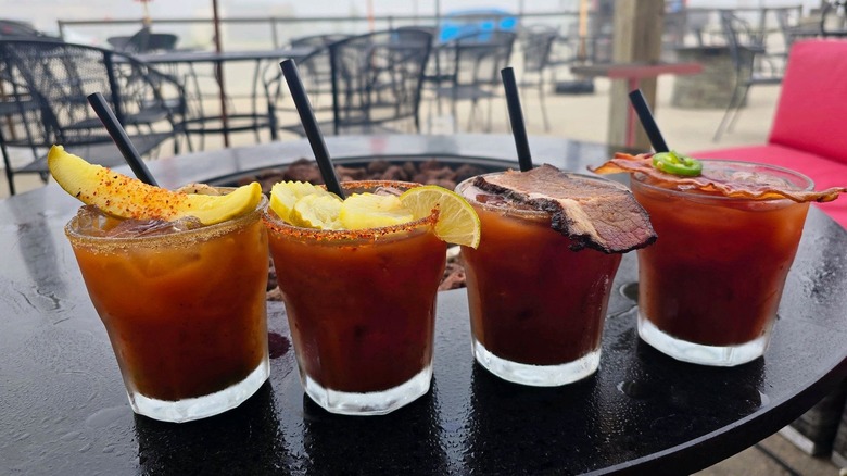 4 short Bloody Marys on patio at Hooligans