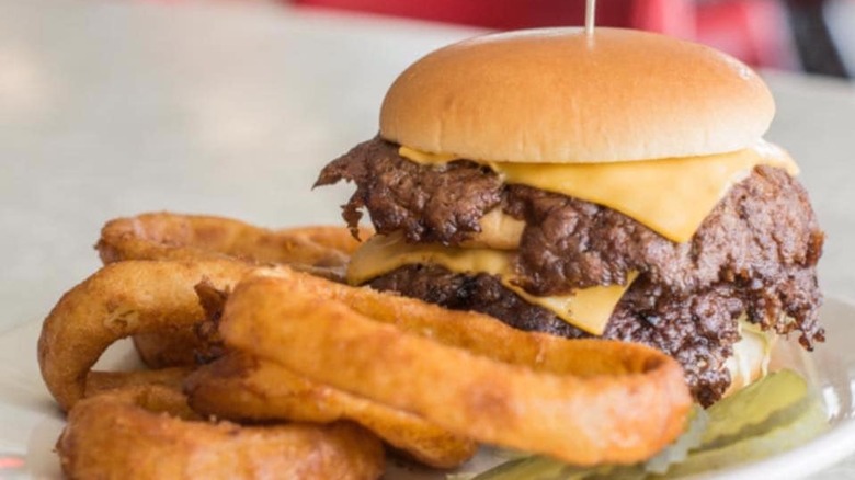 A cheeseburger and onion rings from The Workingman's Friend.