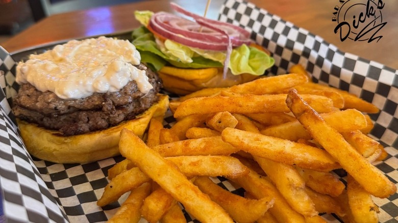 A cheeseburger and fries from Dick's Bar and Grill.