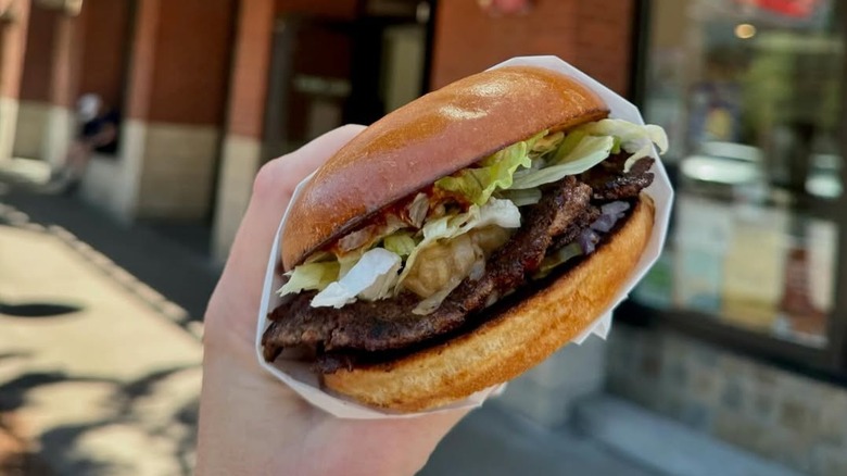 A handheld burger from Big Max Burger Co.