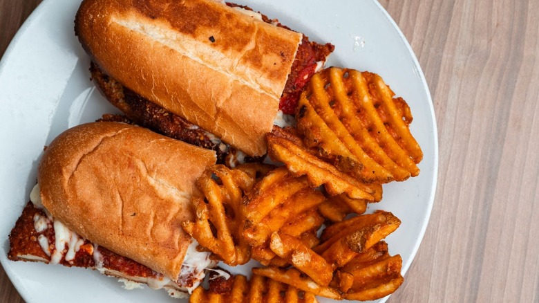 Vito's chicken parm sandwich with waffle fries