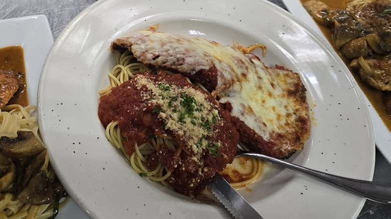 A plate of chicken parm from Rosalie's with a side of spaghetti