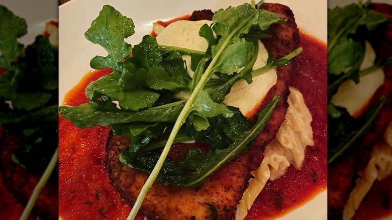 Wild Olive's chicken parm with pasta and fresh greens