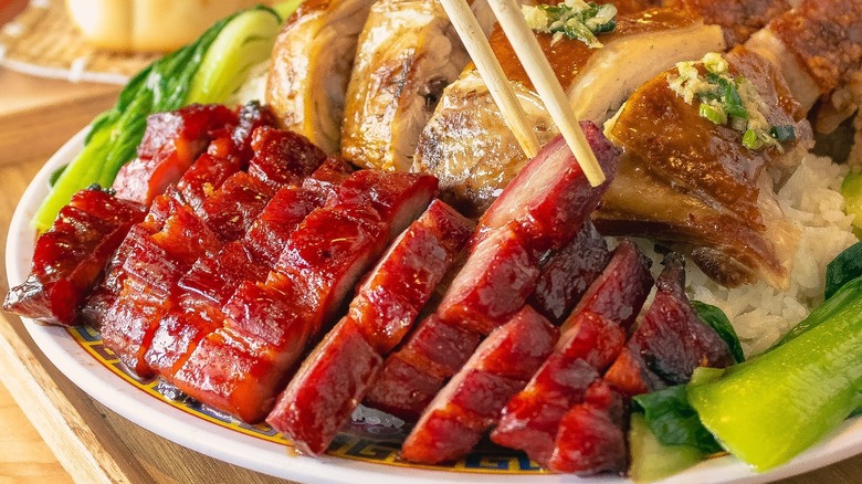 A plate of barbecue meat at Kai Kai BBQ & Dumplings in Orlando