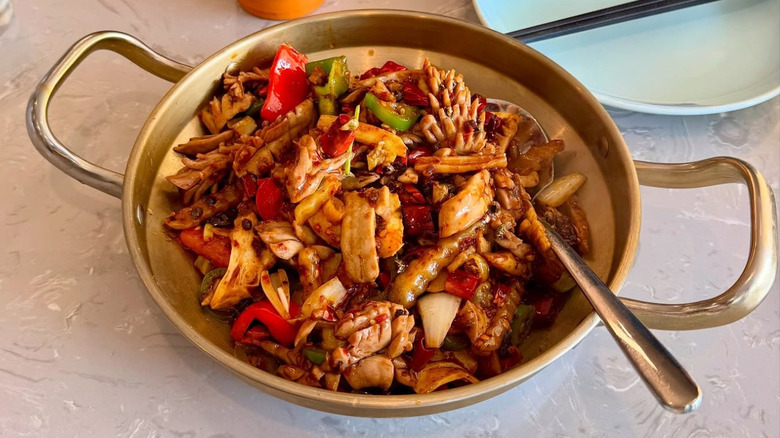 A bowl of stir-fried meat and vegetables at YooYee in Chicago
