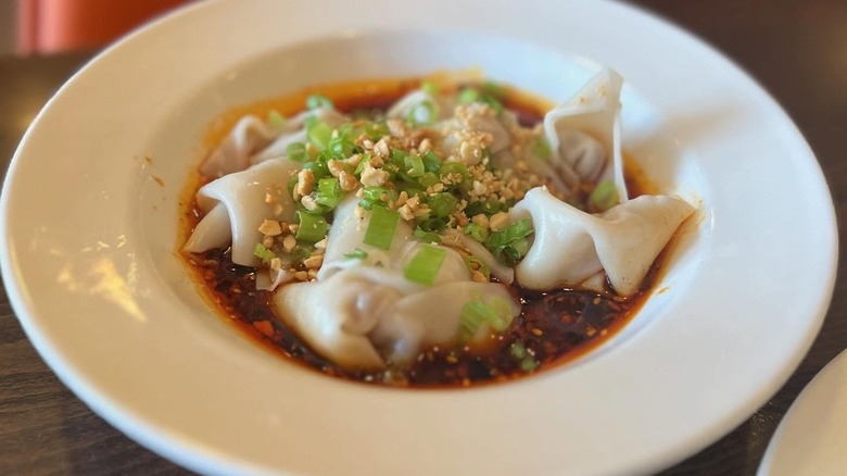 A plate of dumplings in chili oil at LJ Shanghai in Cleveland