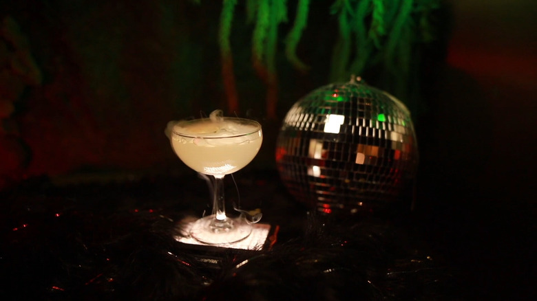 A smoking cocktail and disco ball